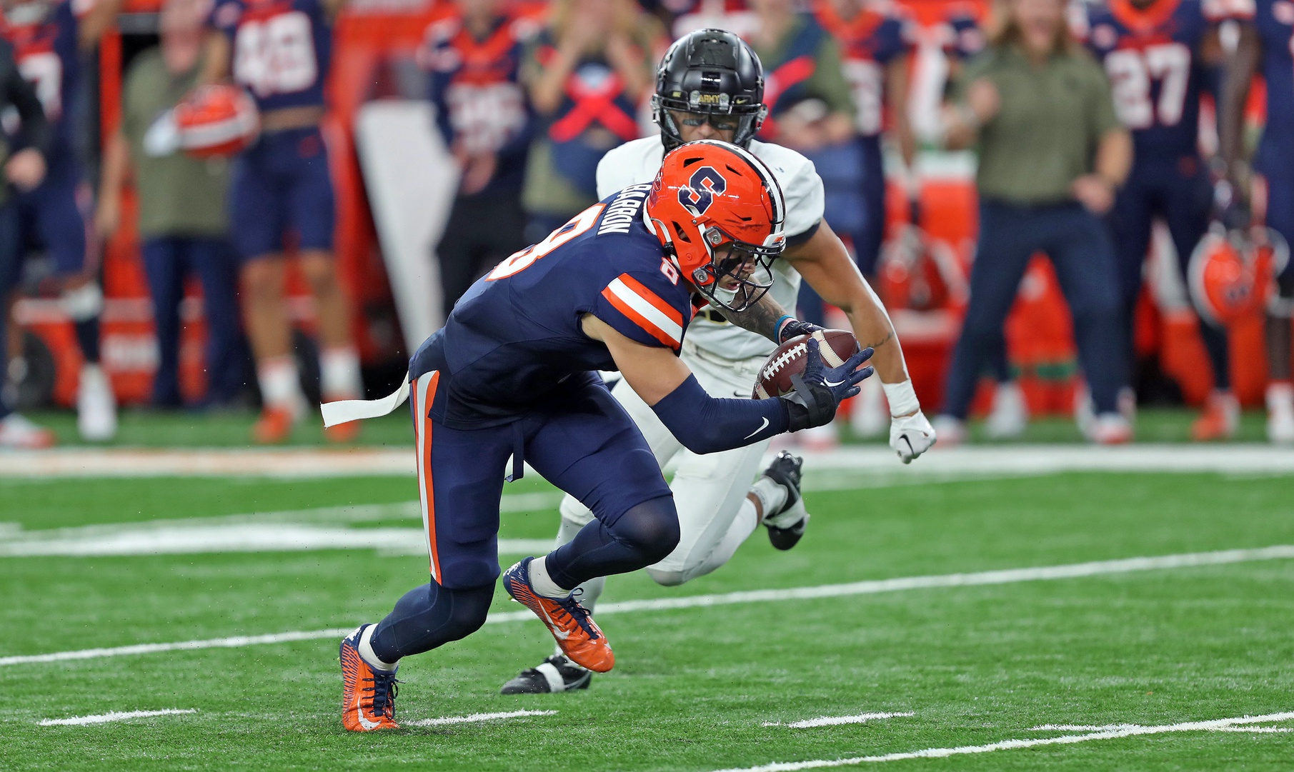 Syracuse Orange defensive back Justin Barron (8) intercepts a pass against the Army Black Knights at JMA Wireless Dome.