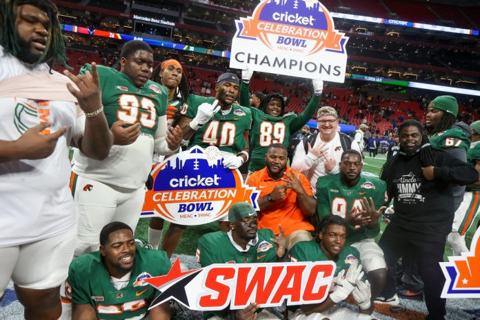 Florida A&M Rattlers players celebrate after a victory against the Howard Bison in the Celebration Bowl at Mercedes-Benz Stadium.