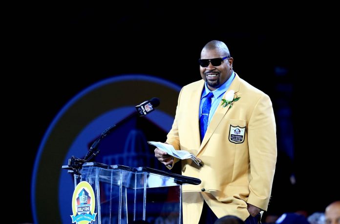 Dallas Cowboys former guard Larry Allen makes his induction speech during the 2013 Pro Football Hall of Fame Enshrinement at Fawcett Stadium.