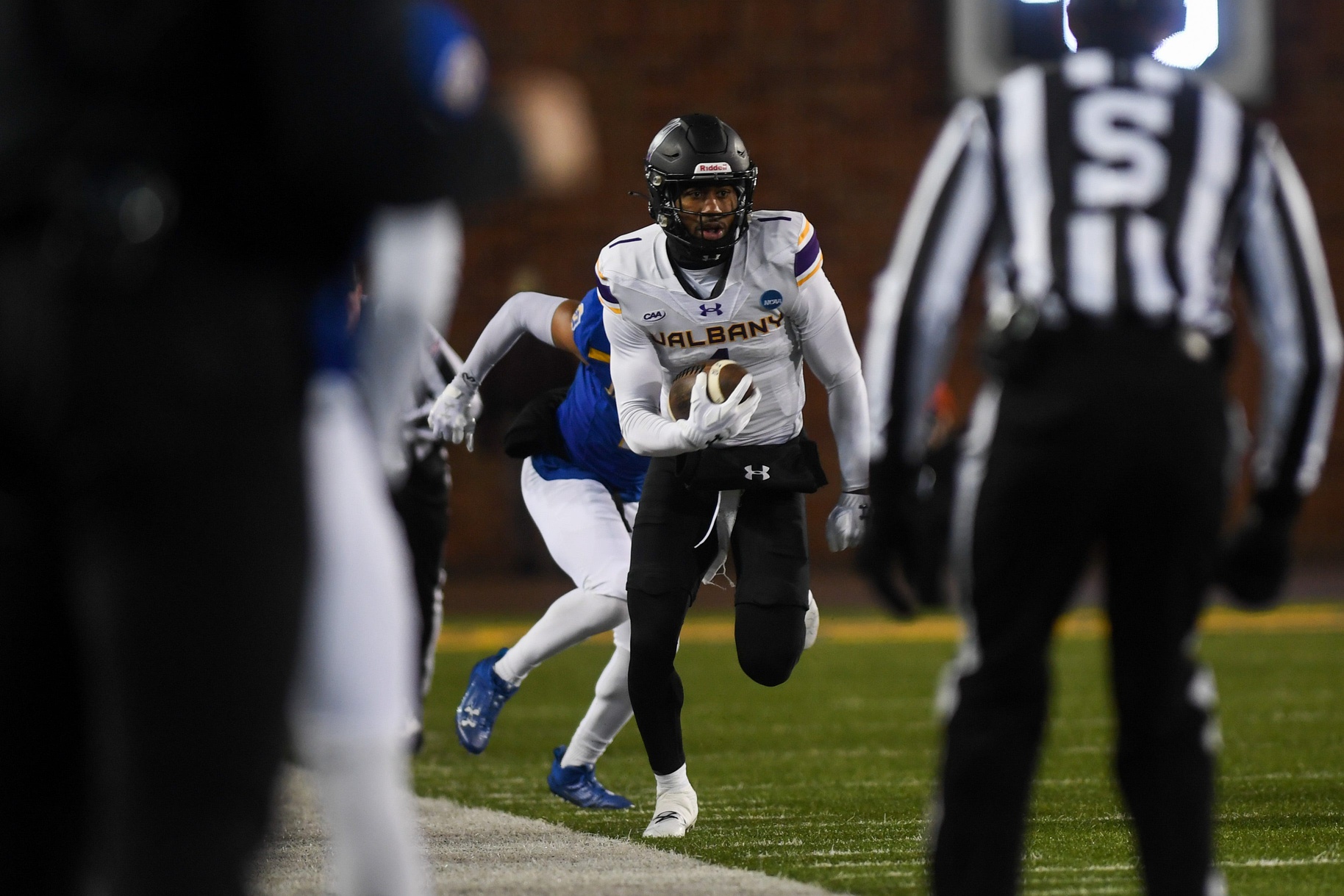 Aamir Hall (1) runs with the ball on Friday, Dec. 15, 2023 at Dana J. Dykhouse in Brookings.