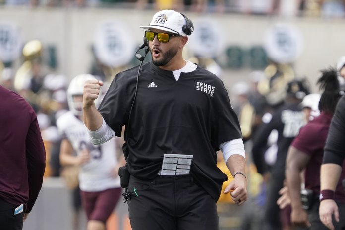 Sep 2, 2023; Waco, Texas, USA; Texas State Bobcats head coach G.J. Kinne reacts after a touchdown against the Baylor Bears during the first half at McLane Stadium. Mandatory Credit: Raymond Carlin III-USA TODAY Sports
