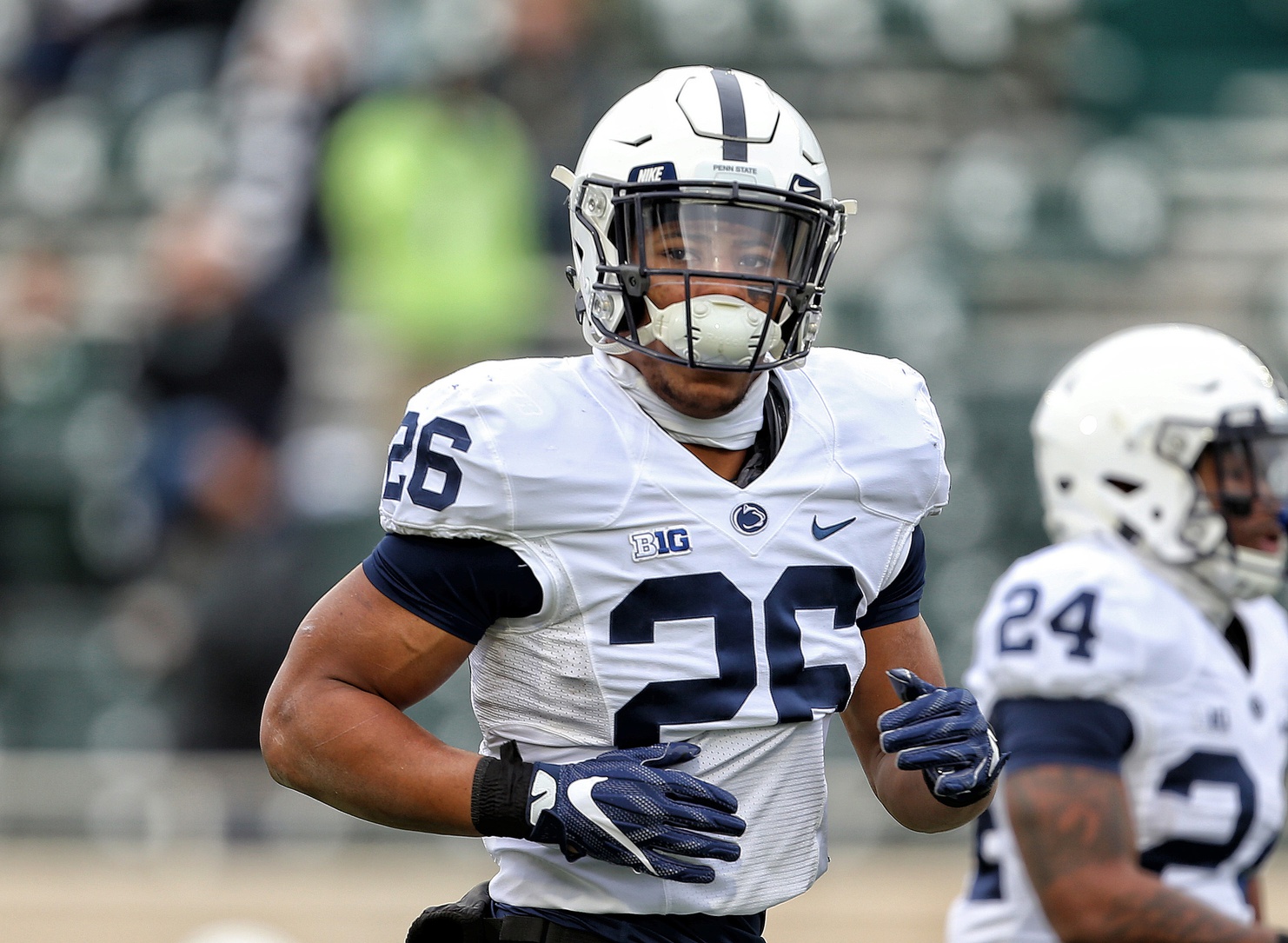 Penn State Nittany Lions running back Saquon Barkley (26) warms up prior to a game against the Michigan State Spartans at Spartan Stadium.