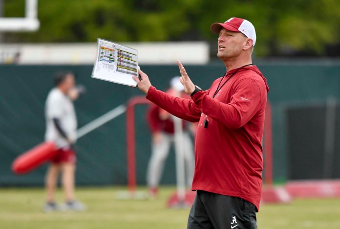 Alabama head coach Kalen DeBoer gives directions during practice at the University Alabama Thursday.