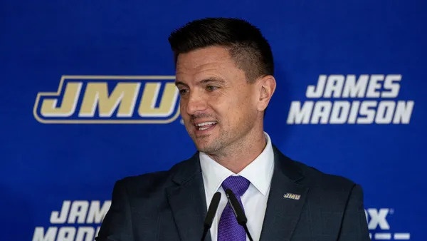 Former Holy Cross football coach Bob Chesney speaks during Tuesday's news conference at James Madison. Credit: Daniel Lin, AP