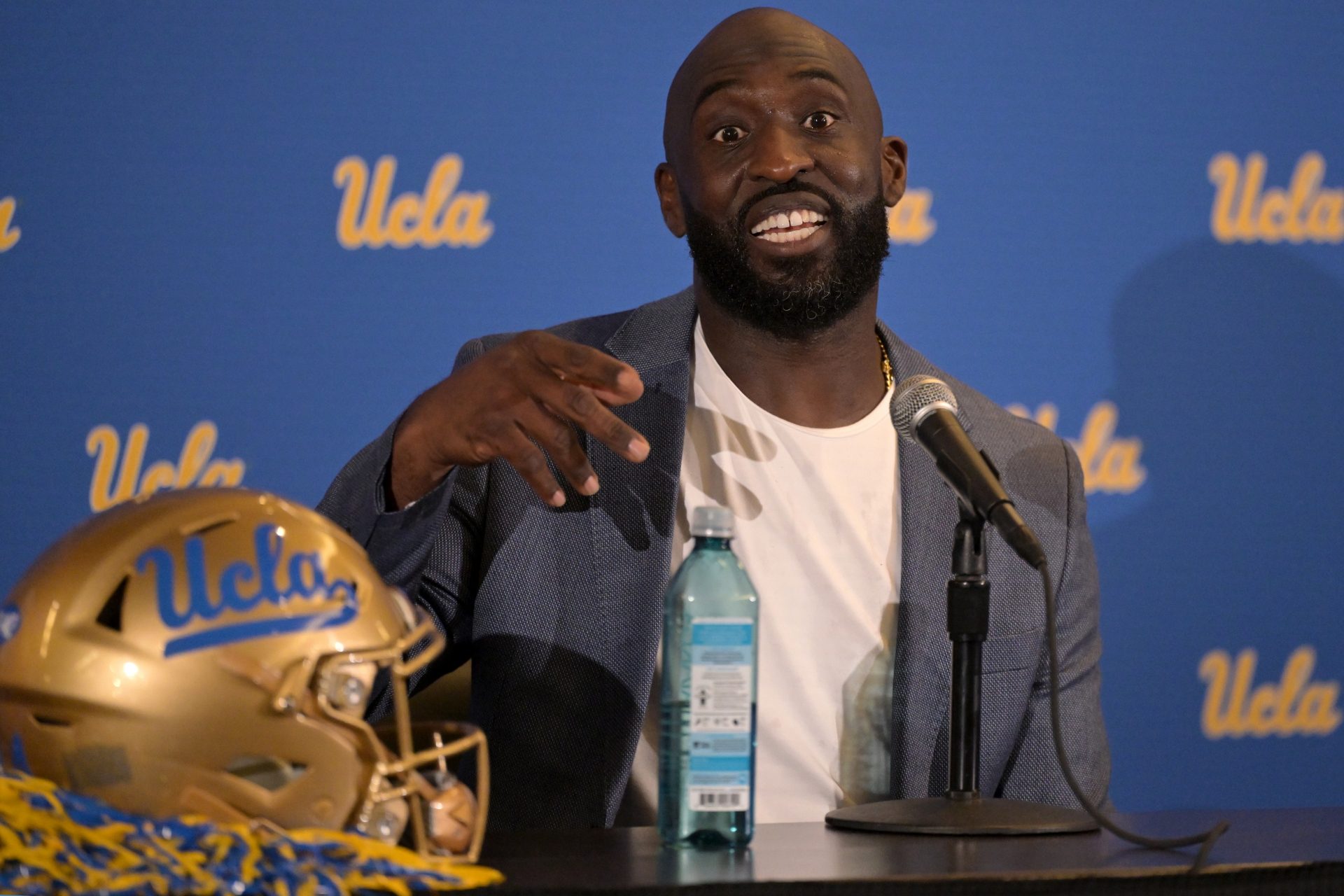 DeShaun Foster answers questions from media after he was introduced as the UCLA Bruins head football coach during a press conference at Pauley Pavilion.