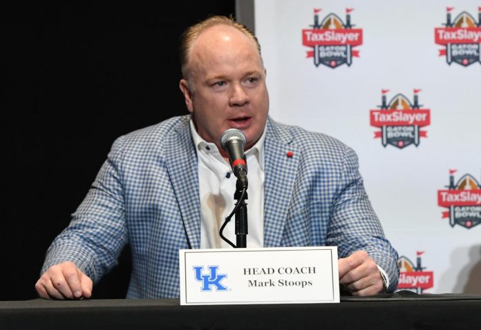 Kentucky Head Coach Mark Stoops talks with media at the TaxSlayer Gator Bowl Press Conference at EverBank Stadium.