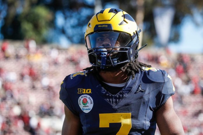 Michigan Wolverines RB Donovan Edwards (7) will don the cover of the EA Sports College Football 25 video game and recently discussed the new gameplay.