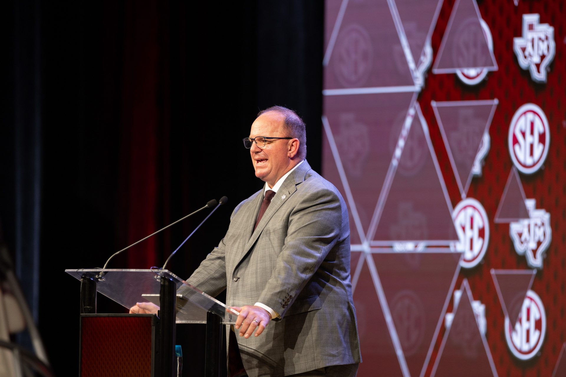 Texas A&M head coach Mike Elko speaking at Omni Dallas Hotel. Mandatory Credit: Brett Patzke-USA TODAY Sports