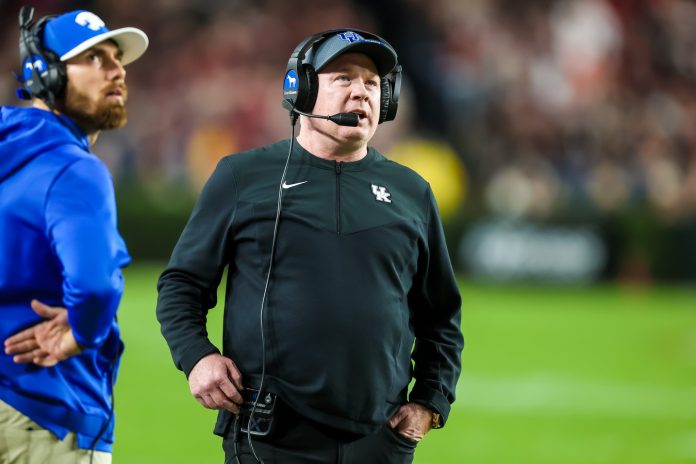 Kentucky Wildcats head coach Mark Stoops directs his team against the South Carolina Gamecocks in the first quarter at Williams-Brice Stadium.