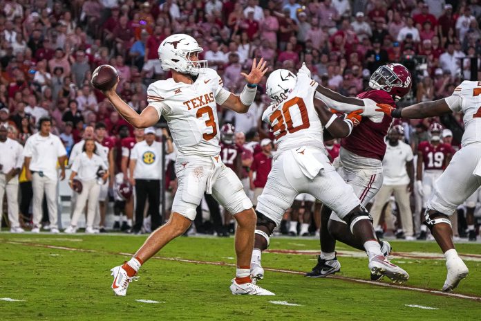 Texas Longhorns quarterback Quinn Ewers (3) throws a pass during the game against Alabama at Bryant-Denny Stadium.