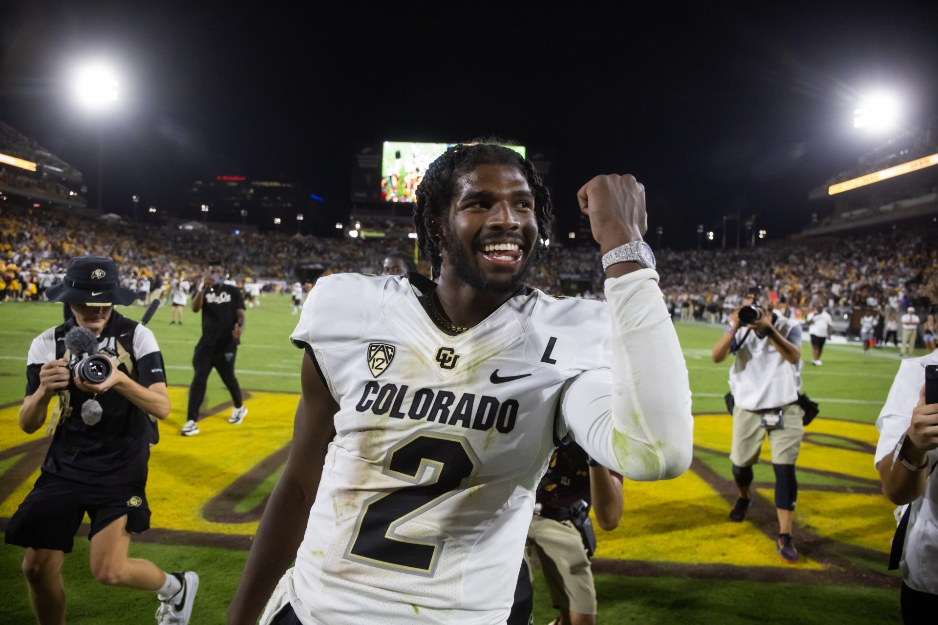 Colorado Buffaloes quarterback Shedeur Sanders (2) celebrates after defeating the Arizona State Sun Devils at Mountain America Stadium, Home of the ASU Sun Devils.