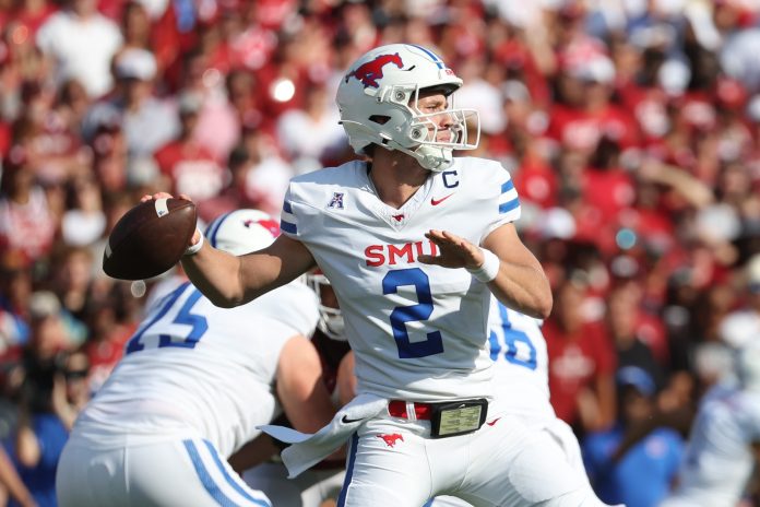 Southern Methodist Mustangs quarterback Preston Stone (2) throws during the first quarter against the Oklahoma Sooners at Gaylord Family-Oklahoma Memorial Stadium.