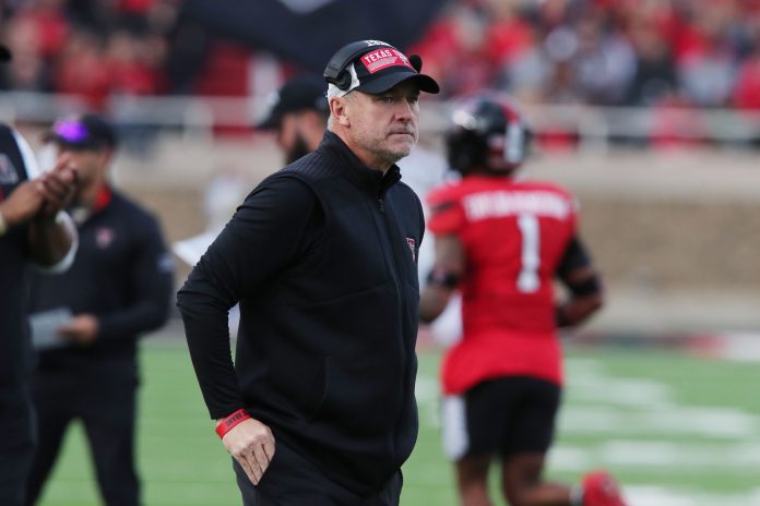 Texas Tech Red Raiders head coach Joey McGuire on the field in the first half during the game against the Central Florida Knights at Jones AT&T Stadium and Cody Campbell Field.