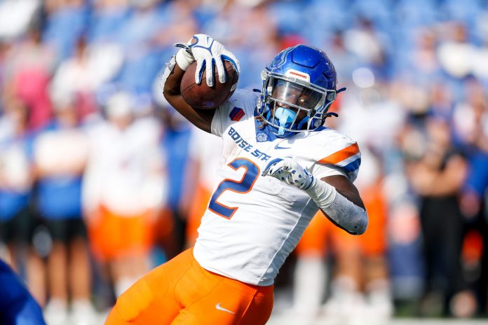 Boise State's Ashton Jeanty (2) dives in for a touchdown during the game between University of Memphis and Boise State University in Memphis.