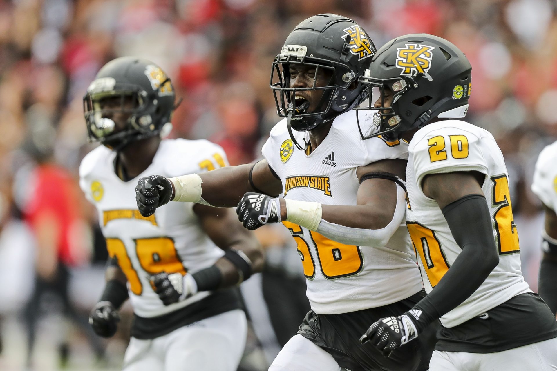 Kennesaw State Owls defensive lineman Demetric Barnes (56) reacts after a turnover by the Cincinnati Bearcats in the first half at Nippert Stadium.