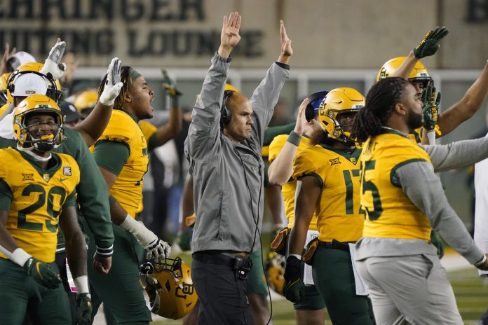 Baylor Bears head coach Dave Aranda readies for the fourth quarter with his team during the second half against the Baylor Bears at McLane Stadium.