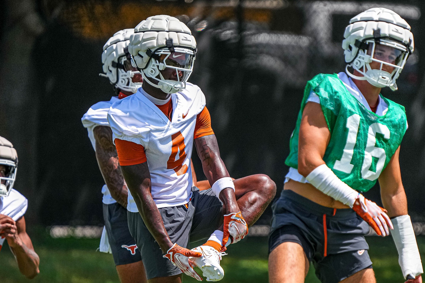 Andrew Mukuba (4) defensive back for the Texas Longhorns stretches at practice at Frank Denius Fields.