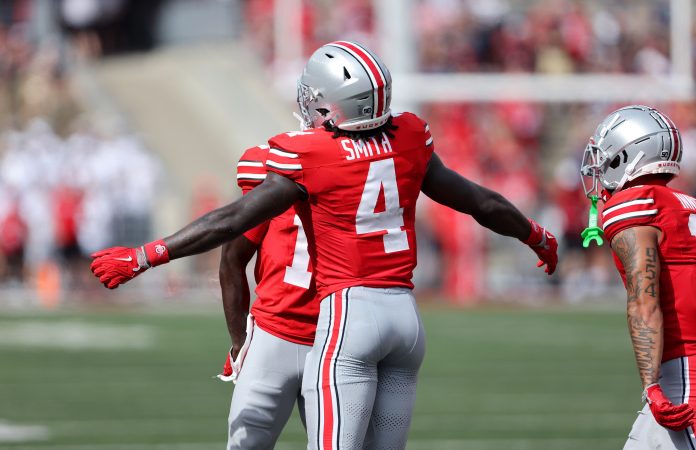 Ohio State Buckeyes wide receiver Jeremiah Smith (4) celebrates after scoring a touchdown against the Akron Zips during the first quarter at Ohio Stadium.