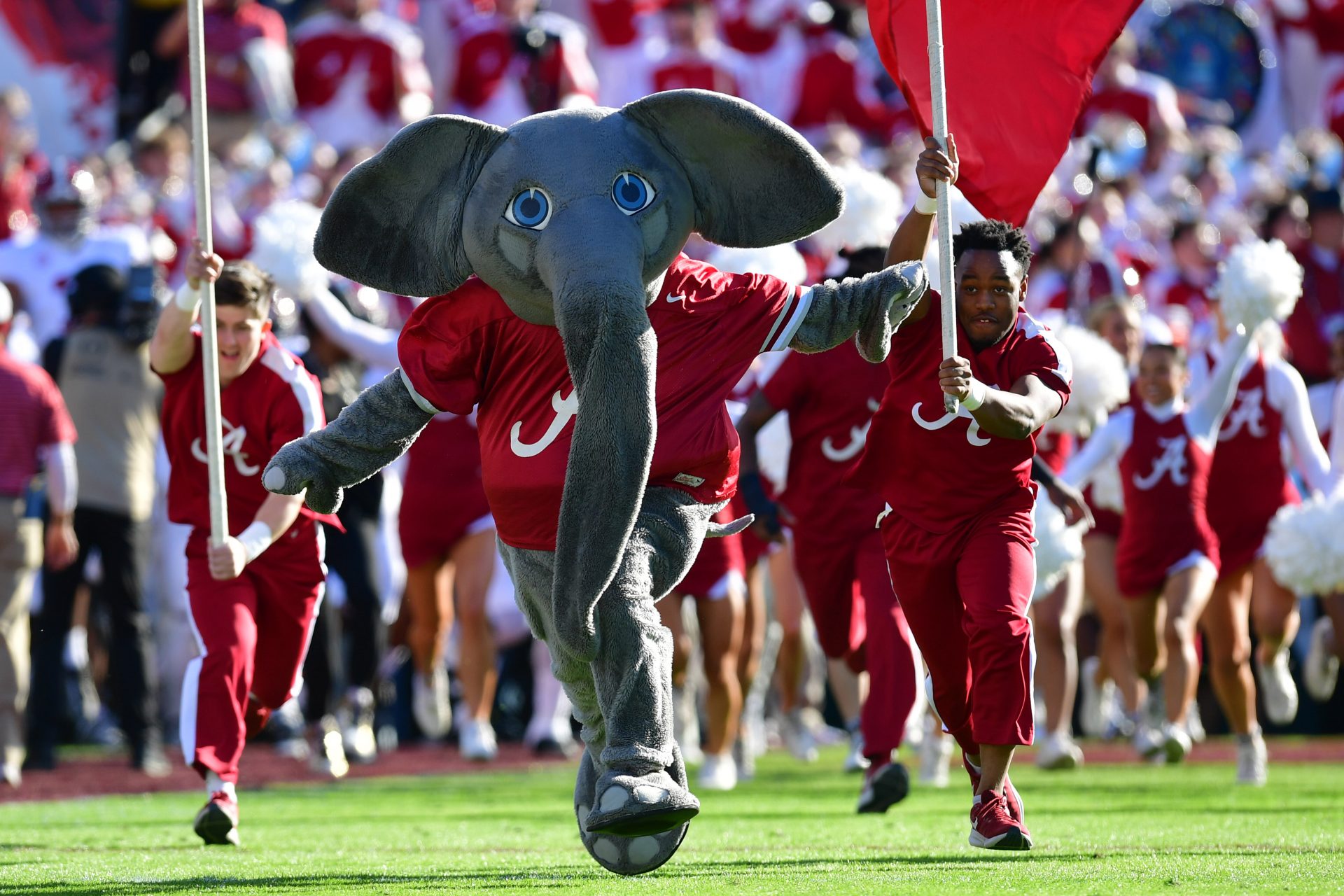 Jan 1, 2024; Pasadena, CA, USA; Alabama Crimson Tide mascot Big Al leads the team onto the field before the 2024 Rose Bowl college football playoff semifinal game against the Michigan Wolverines at Rose Bowl. Mandatory Credit: Gary A. Vasquez-USA TODAY Sports