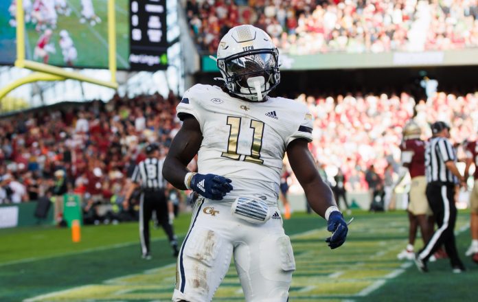 Georgia Tech running back Jamal Haynes celebrates a touch down against Florida State at Aviva Stadium.