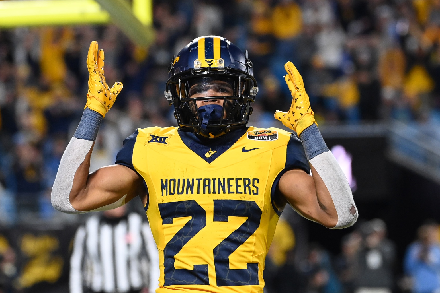 West Virginia Mountaineers running back Jahiem White (22) reacts after scoring a touchdown in the fourth quarter at Bank of America Stadium.