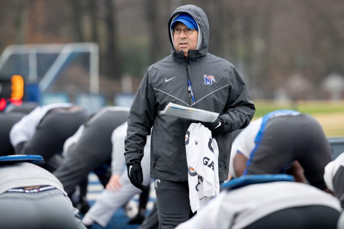 Pete Lembo watches as players warm up Tuesday, Dec. 17, 2019, during a practice at University of Memphis' Billy J Murphy Athletic Complex. 121719memphisfbpetelembo01