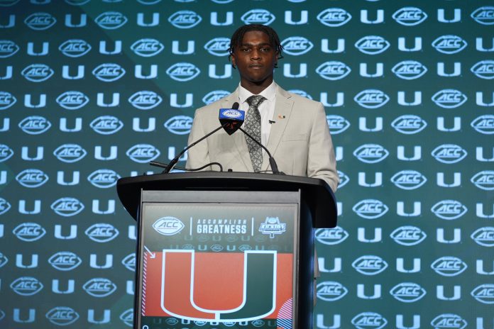 Jul 24, 2024; Charlotte, NC, USA; Miami Hurricanes quarterback Cam Ward speaks to the media during the ACC Kickoff at Hilton Charlotte Uptown. Mandatory Credit: Jim Dedmon-USA TODAY Sports