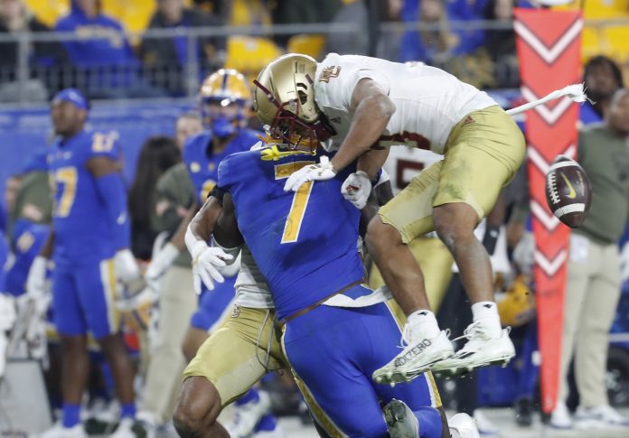 Boston College Eagles defensive back Khari Johnson (3) commits a targeting penalty against Pittsburgh Panthers tight end Malcolm Epps (7) during the second quarter at Acrisure Stadium. Mandatory Credit: Charles LeClaire-USA TODAY Sports