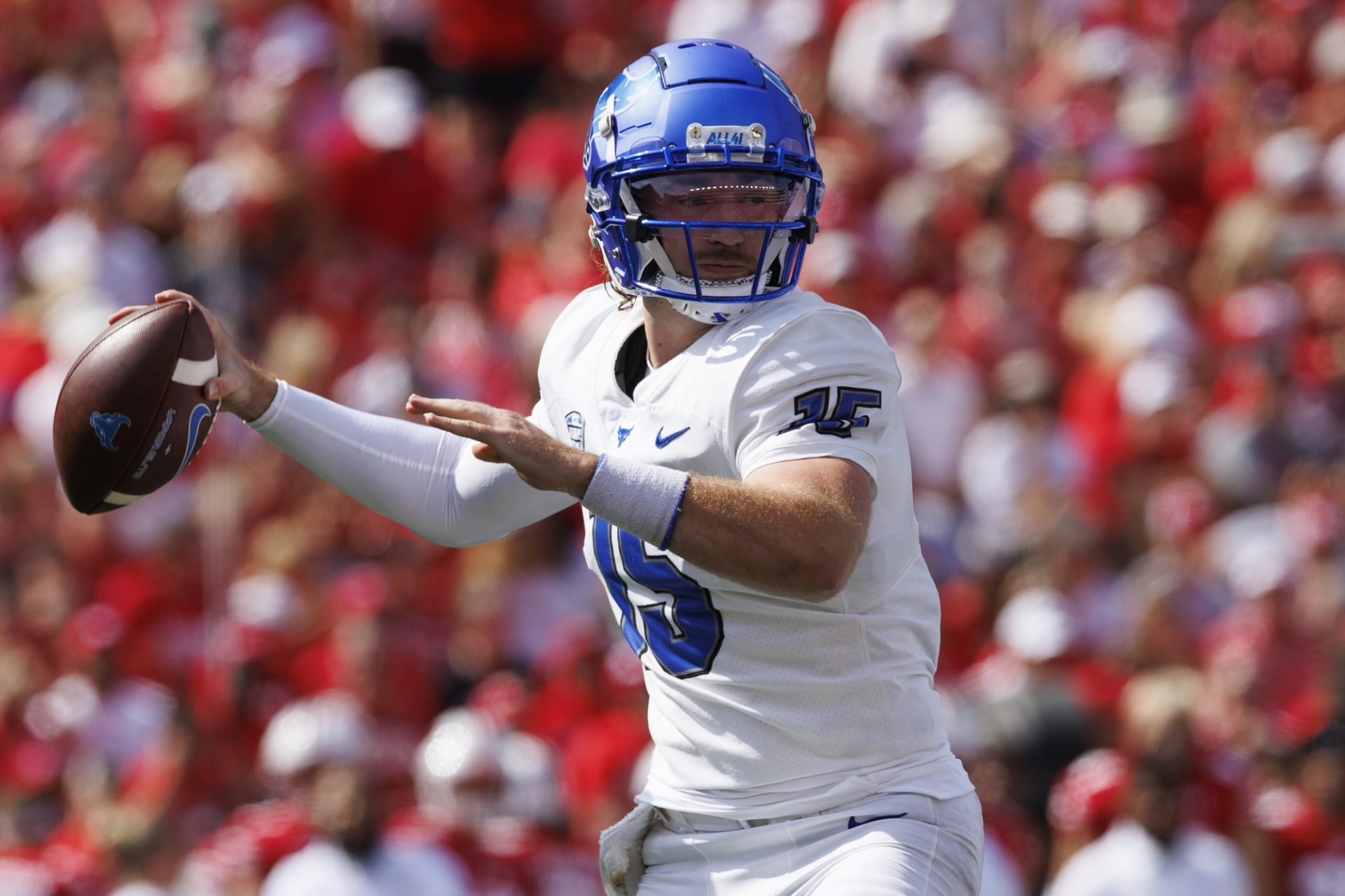 Buffalo Bulls quarterback Cole Snyder (15) throws a pass during the first quarter against the Wisconsin Badgers at Camp Randall Stadium. Mandatory Credit: Jeff Hanisch-USA TODAY Sports