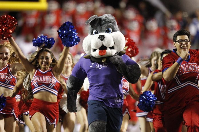 Oct 10, 2015; Fresno, CA, USA; Fresno State Bulldogs mascot, Timeout, runs onto the field before the start of the game against the Utah State Aggies at Bulldog Stadium. Mandatory Credit: Cary Edmondson-USA TODAY Sports