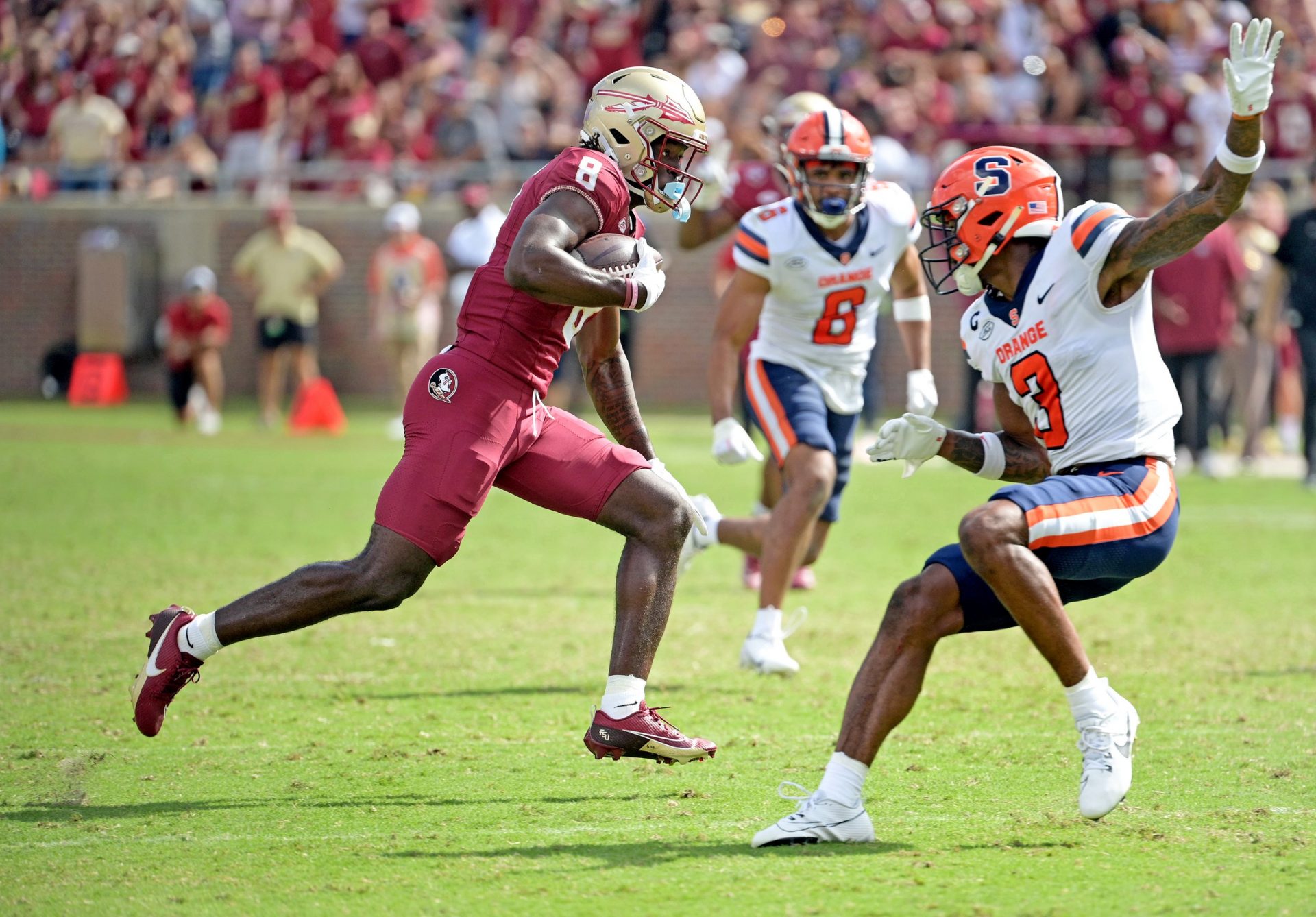 Florida State Seminoles wide receiver Hykeem Williams (8) scores a touchdown during the second half against the Syracuse Orange at Doak S. Campbell Stadium. Mandatory Credit: Melina Myers-USA TODAY Sports