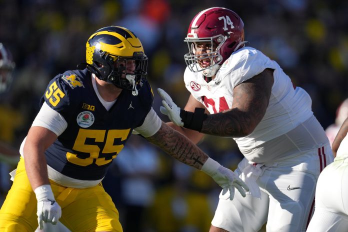 Alabama Crimson Tide offensive lineman Kadyn Proctor (74) blocks Michigan Wolverines defensive lineman Mason Graham (55) during the first half in the 2024 Rose Bowl college football playoff semifinal game at Rose Bowl. Mandatory Credit: Kirby Lee-USA TODAY Sports