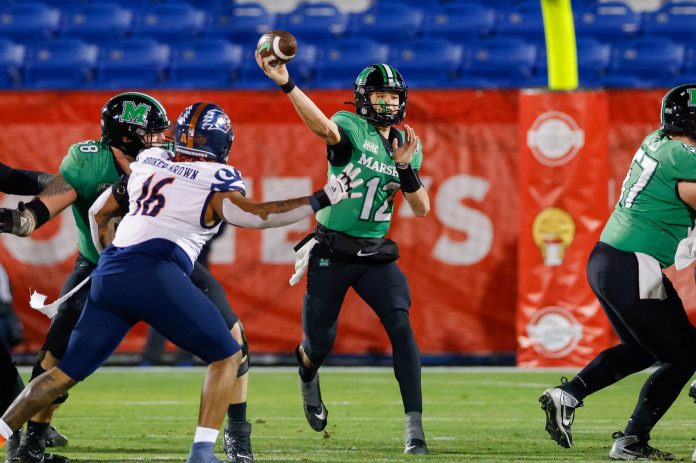 Dec 19, 2023; Frisco, TX, USA; Marshall Thundering Herd quarterback Cole Pennington (12) throws a pass during the fourth quarter against the UTSA Roadrunners at Toyota Stadium. Mandatory Credit: Andrew Dieb-USA TODAY Sports