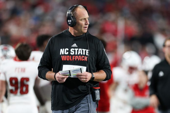 North Carolina State Wolfpack head coach Dave Doeren looks on from the sidelines during the Pop-Tarts bowl against Kansas State Wildcats in the fourth quarter at Camping World Stadium. Mandatory Credit: Nathan Ray Seebeck-USA TODAY Sports