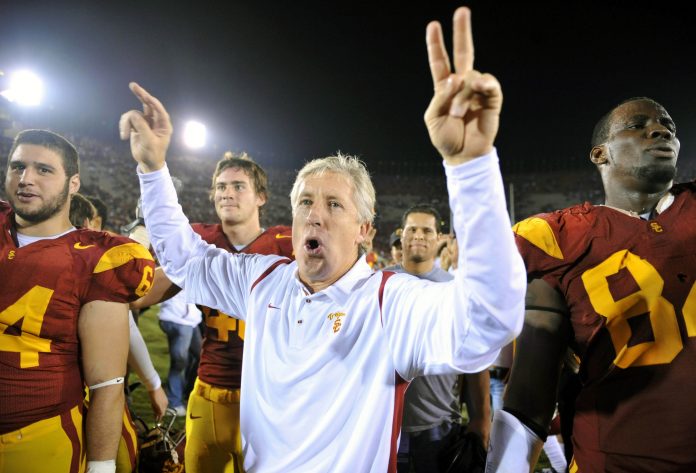 Southern California Trojans coach Pete Carroll celebrates after game against the California Golden Bears at the Los Angeles Memorial Coliseum. USC defeated California 17-3. Mandatory Credit: Kirby Lee/Image of Sport-USA TODAY Sports