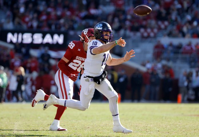 TCU Horned Frogs quarterback Josh Hoover (10) throws a pass as Oklahoma Sooners linebacker Danny Stutsman (28) pursues him during a college football game between the University of Oklahoma Sooners (OU) and the TCU Horned Frogs at Gaylord Family-Oklahoma Memorial Stadium in Norman, Okla., Friday, Nov. 24, 2023. Oklahoma won 69-45. How does he play into our Stanford vs. TCU prediction?