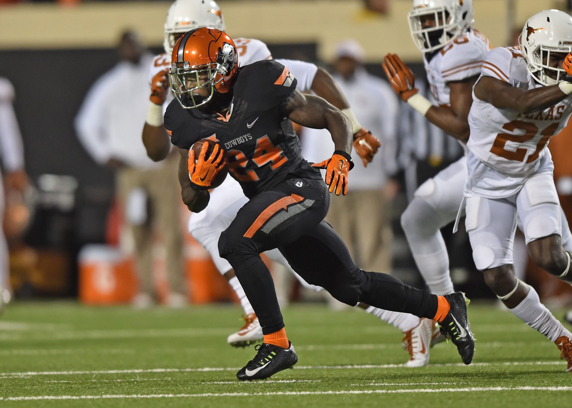 Oklahoma State Cowboys running back Tyreek Hill (24) rushes up field against the Texas Longhorns during the second half at Boone Pickens Stadium. Texas defeated Oklahoma State 28-7. Mandatory Credit: Peter G. Aiken-USA TODAY Sports