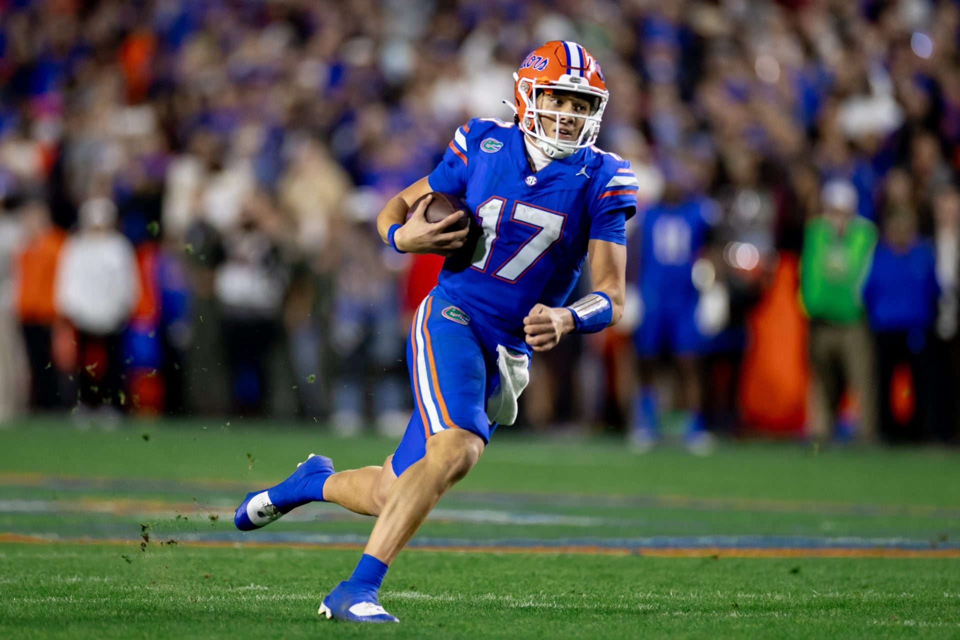 Florida Gators quarterback Max Brown (17) rushes with the ball during the second half against the Florida State Seminoles at Steve Spurrier Field at Ben Hill Griffin Stadium in Gainesville, FL on Saturday, November 25, 2023. [Matt Pendleton/Gainesville Sun]