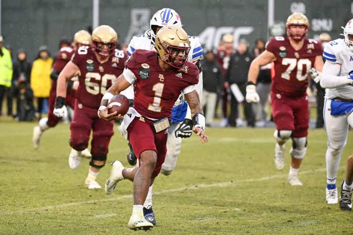 Boston College Eagles quarterback Thomas Castellanos (1) runs the ball against the Southern Methodist Mustangs during the second half at Fenway Park. Mandatory Credit: Eric Canha-USA TODAY Sports