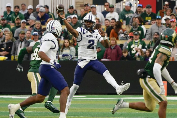 Nevada Wolf Pack quarterback Brendon Lewis (2) throws a pass on the run against the Colorado State Rams at Sonny Lubick Field at Canvas Stadium. Mandatory Credit: Michael Madrid-USA TODAY Sports