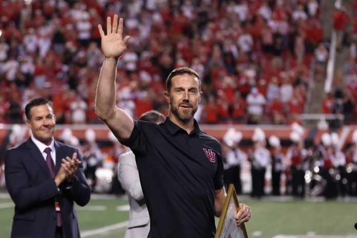 Former NFL and Utah quarterback Alex Smith is introduce into the circle or honor during halftime in the game between the Utah Utes and the Southern Utah Thunderbirds at Rice-Eccles Stadium.