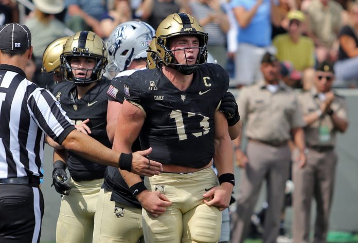 Army Black Knights quarterback Bryson Daily (13) reacts after scoring a touchdown against the Rice Owls during the first half at Michie Stadium.