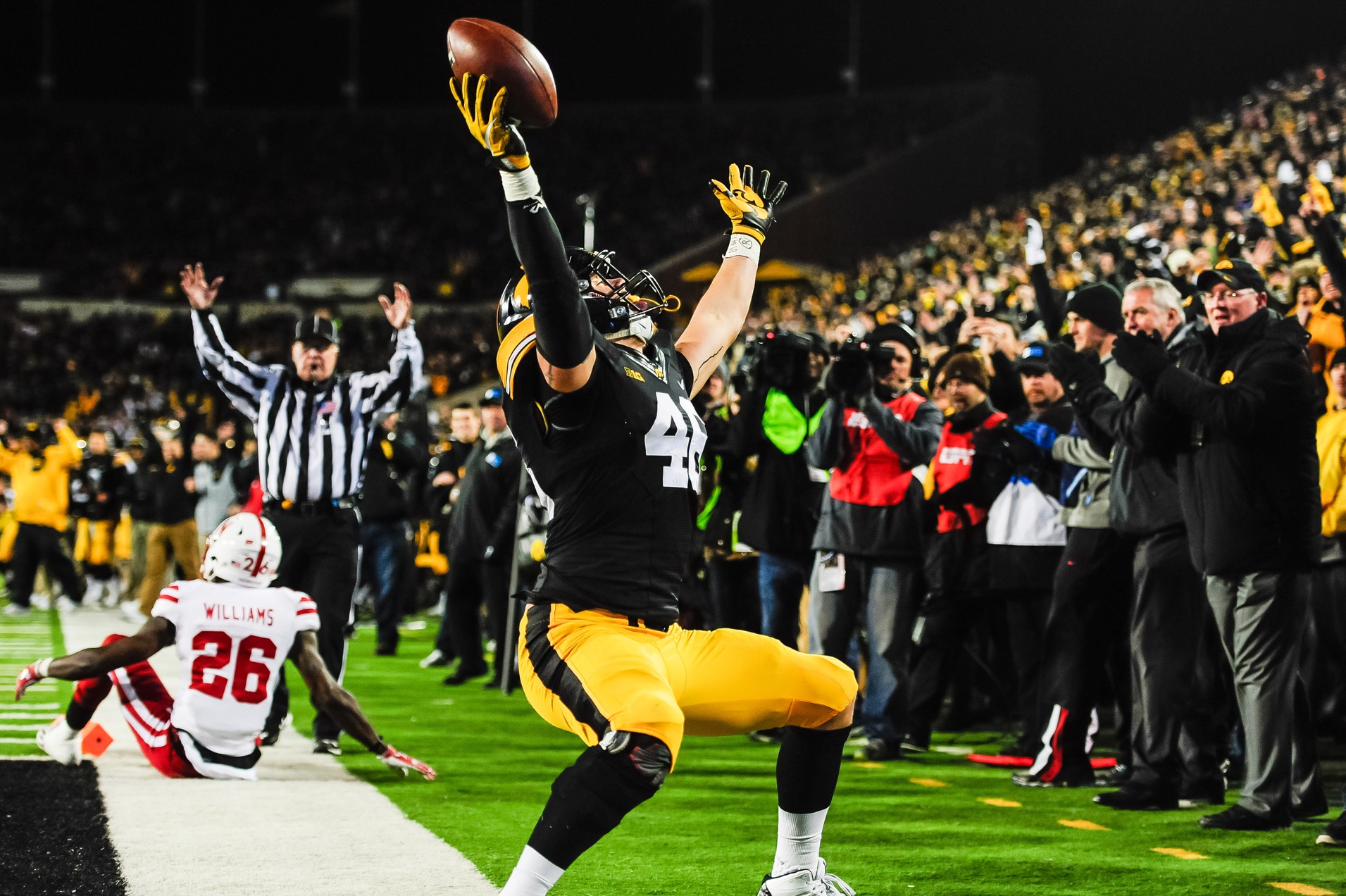 Iowa Hawkeyes tight end George Kittle (46) celebrates after a touchdown catch during the second half against the Nebraska Cornhuskers at Kinnick Stadium.