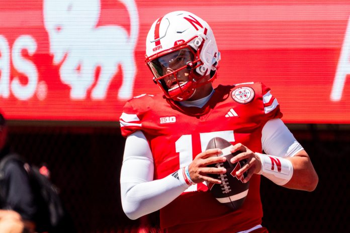 Nebraska Cornhuskers quarterback Dylan Raiola (15) warms up before a game against the UTEP Miners at Memorial Stadium.