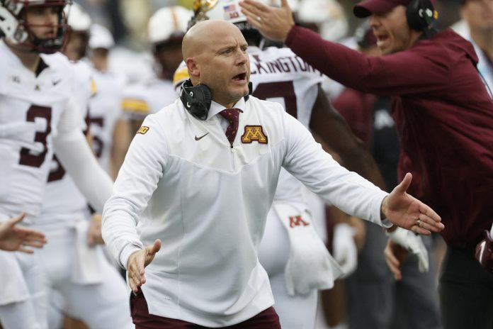 Minnesota Golden Gophers head coach P. J. Fleck reacts on the sideline in the second half against the Michigan Wolverines at Michigan Stadium.