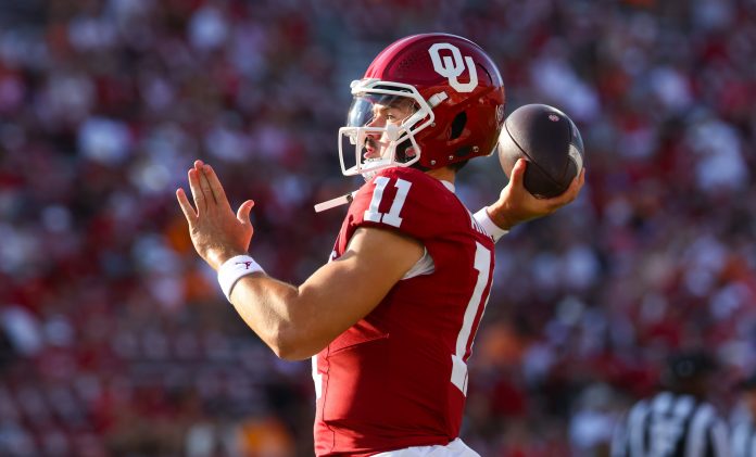 Oklahoma Sooners quarterback Jackson Arnold (11) warms up before the game against the Tennessee Volunteers at Gaylord Family-Oklahoma Memorial Stadium.