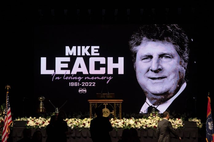 Last-minute preparations continue for the Mike Leach memorial service in Humphrey Coliseum at Mississippi State.