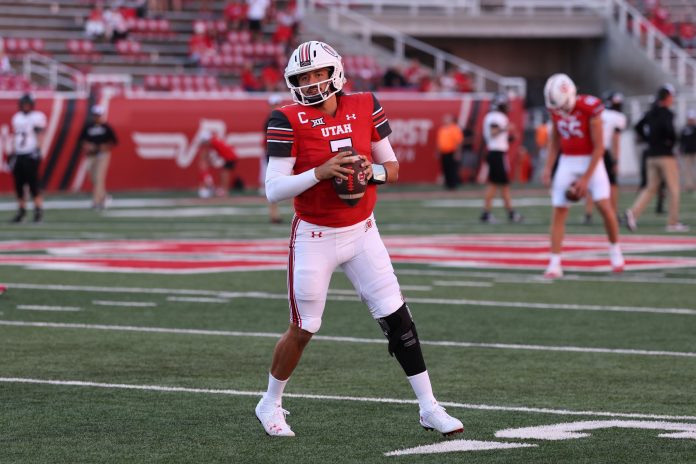 Utah Utes quarterback Cameron Rising (7) warms up before the game against the Southern Utah Thunderbirds at Rice-Eccles Stadium.