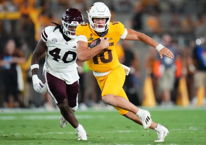 Arizona State quarterback Sam Leavitt (10) scrambles past Mississippi State Bulldogs linebacker Nic Mitchell (40) at Mountain America Stadium on Sept. 7, 2024, in Tempe.