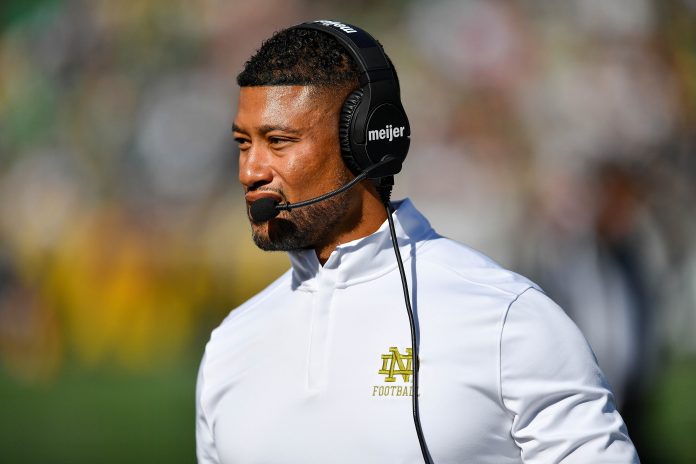 Notre Dame Fighting Irish head coach Marcus Freeman walks to the sideline in the second quarter against the Northern Illinois Huskies at Notre Dame Stadium. Mandatory Credit: Matt Cashore-Imagn Images